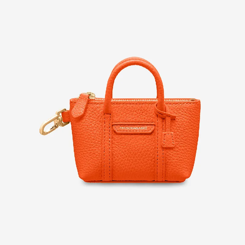 The SABRÉMOJI™ Weekender Charm - Manhattan Orange